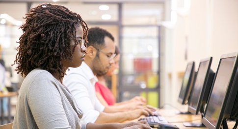 Enterprise team participating in generative AI training workshop with instructor